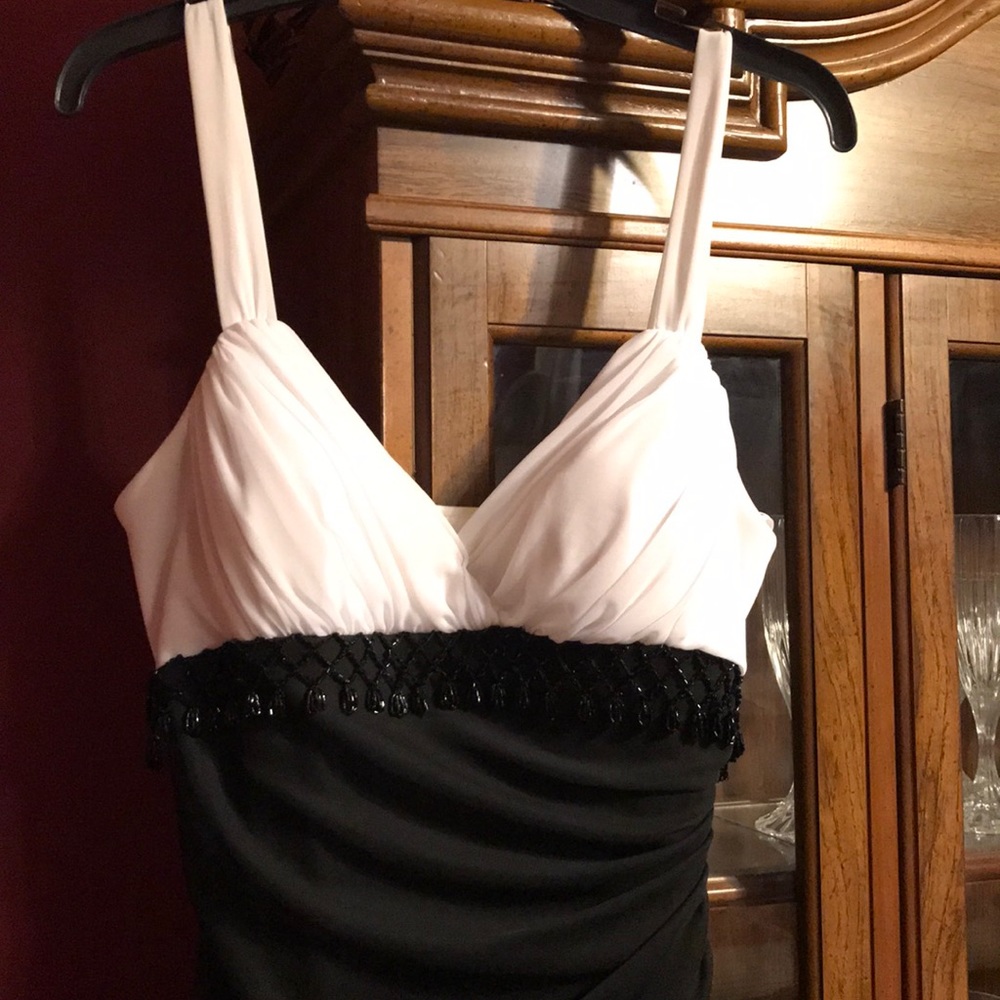 Black and white gown with beads and side zipper